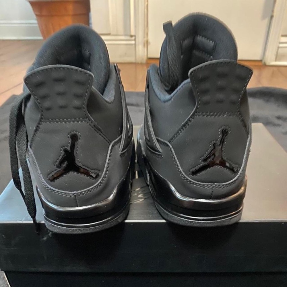 Black Cat Jordan 4s